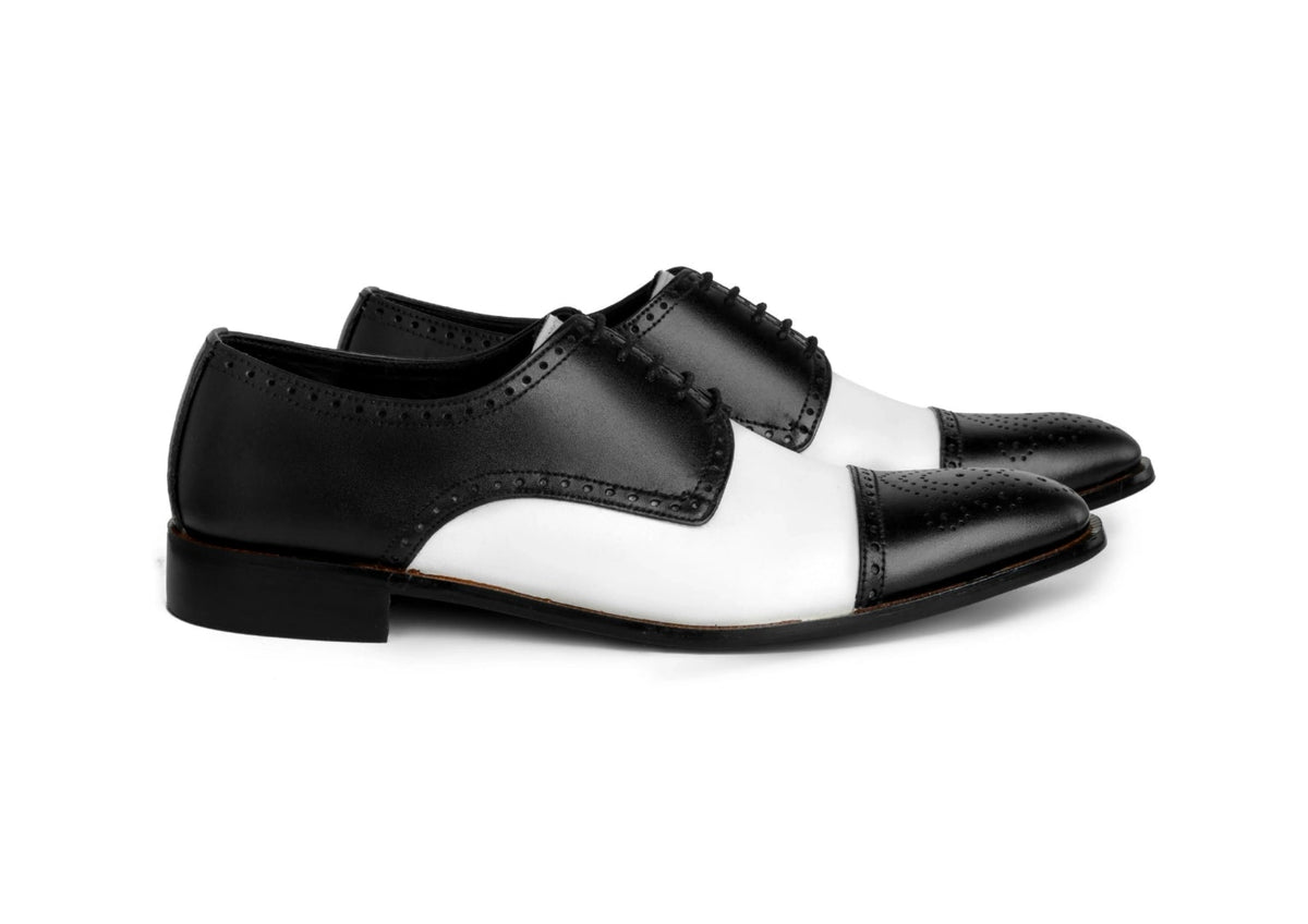 Bold Brogue men’s black and white dress shoes classic brogue style in premium studio hero shot showcasing bold contrast formal design