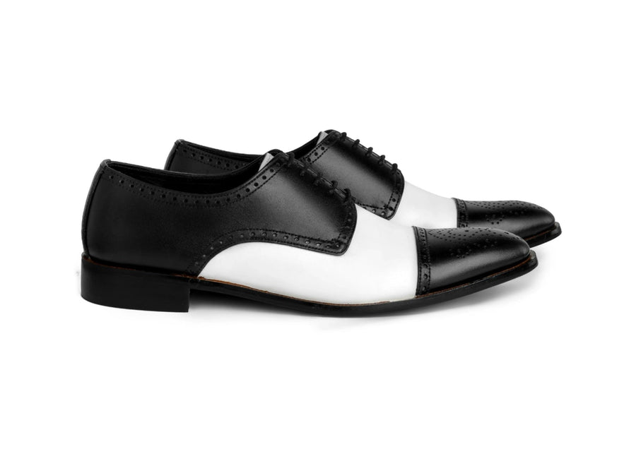 Bold Brogue men’s black and white dress shoes classic brogue style in premium studio hero shot showcasing bold contrast formal design
