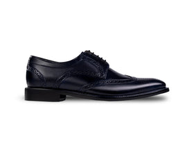 The Atlantic Brogue men’s navy wingtip derby brogue dress shoe side profile