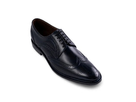 The Atlantic Brogue men’s navy wingtip brogue dress shoe three-quarter view