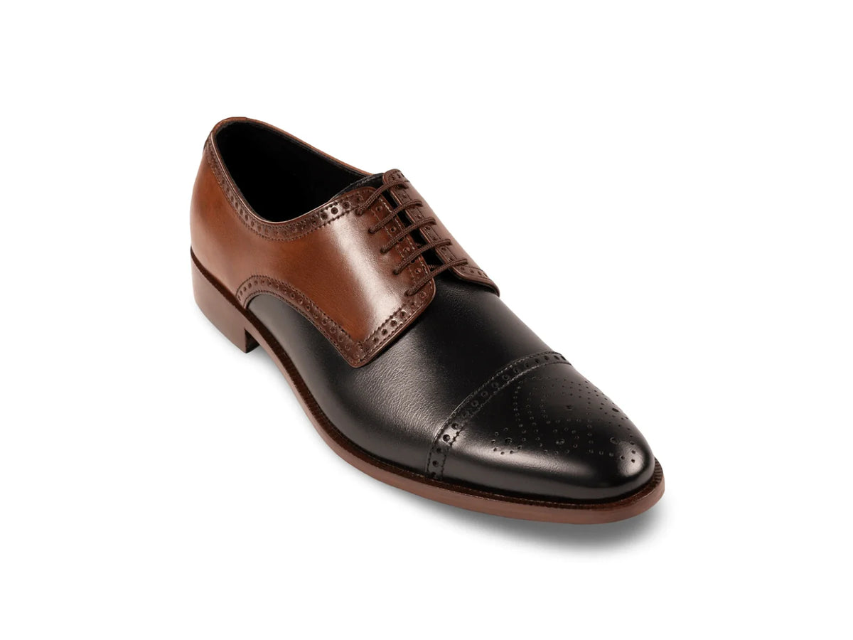 The Kensington Two-Tone men’s cognac and black cap-toe oxford dress shoe three-quarter view