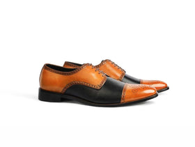 The Valoric Viceroy men’s two-tone cap-toe oxford dress shoes side view cognac and black