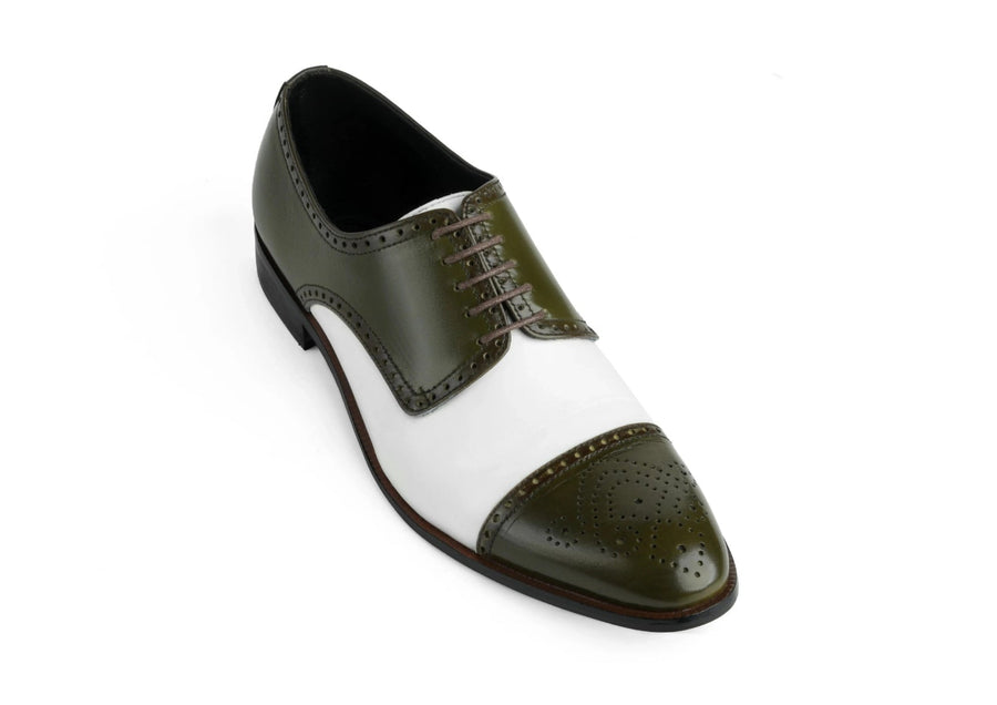 Close-up detail of Ebony and Ivory brogue shoes highlighting perforated leather craftsmanship and premium finishing