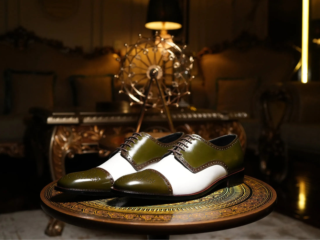 Editorial shot of Ebony and Ivory brogue shoes styled with suit in urban setting representing bold luxury formal footwear